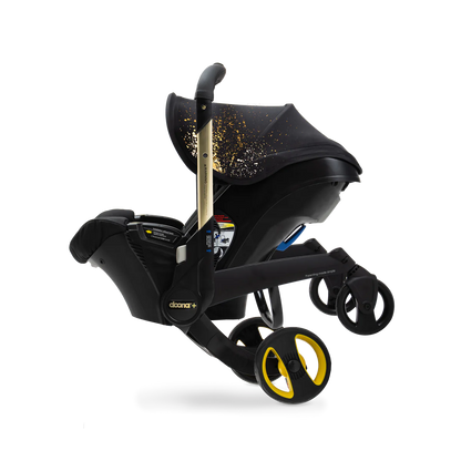 black and gold car seat and stroller Doona+ Infant Car Seat + Stroller