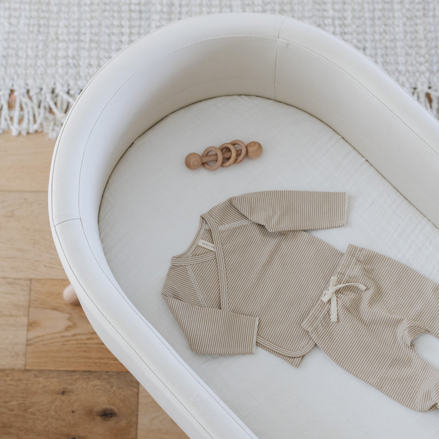M26834GYLB,Babyletto,babyletto x GATHRE Capsule Bassinet in Ivory